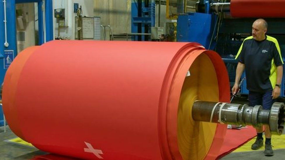 One of the reels of red paper