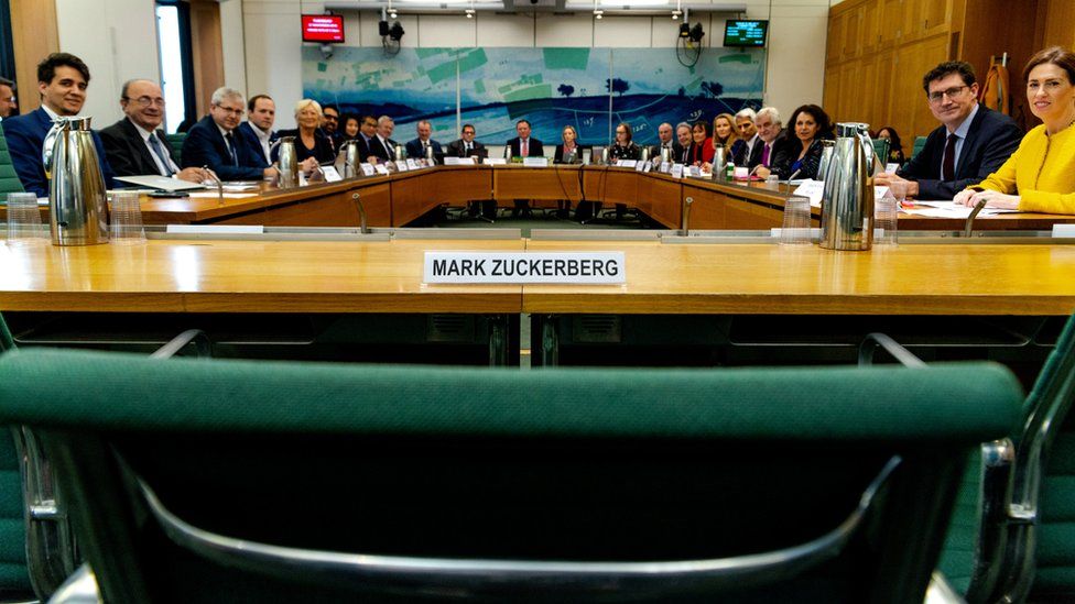 A meeting of the DCMS committee empty-chairing Mark Zuckerberg