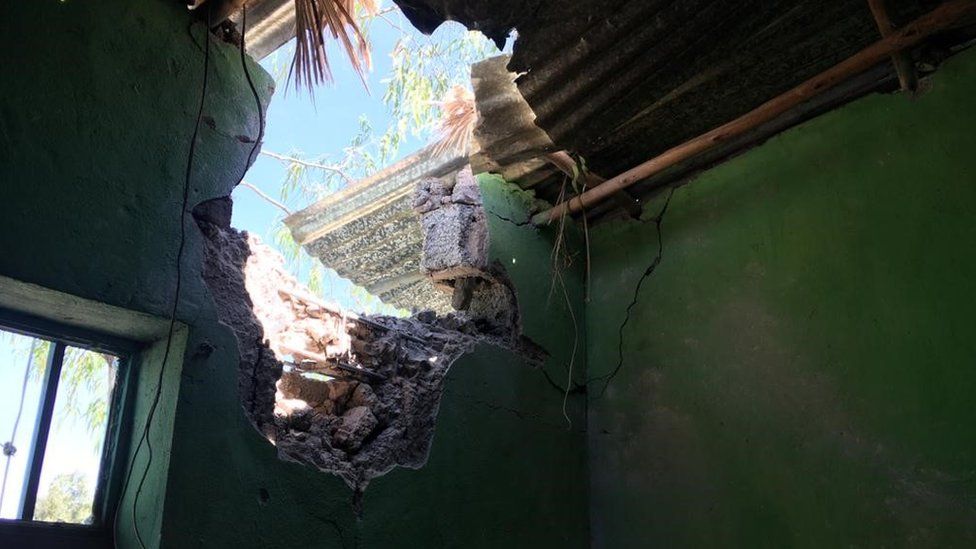 Building hit by shelling in Mekelle before 28 November