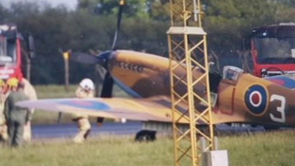 Coningsby BBMF Spitfire comes off runway on landing BBC News