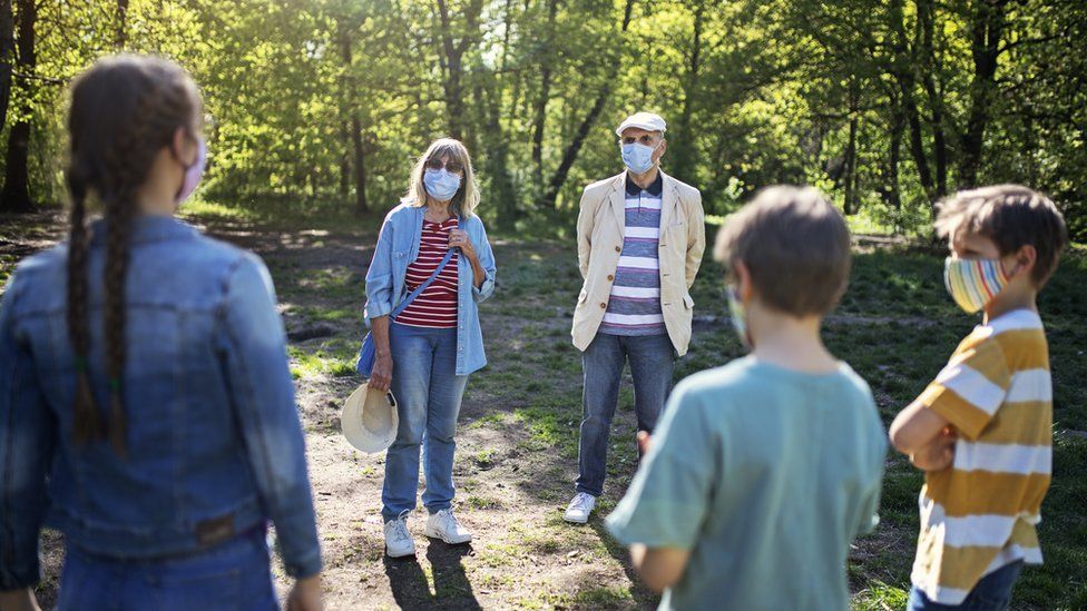 Older couple meeting children