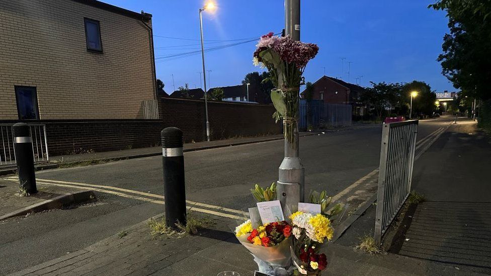 Tributes near  for the teenage lad  astatine  the scene