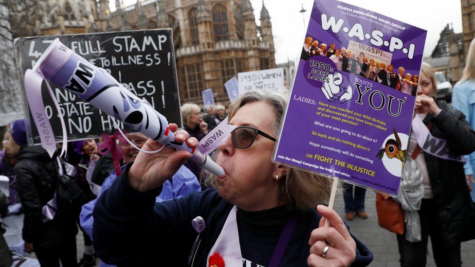 Women protest against changes to the state pension outside the Houses of Parliament in London, 8 March 2017