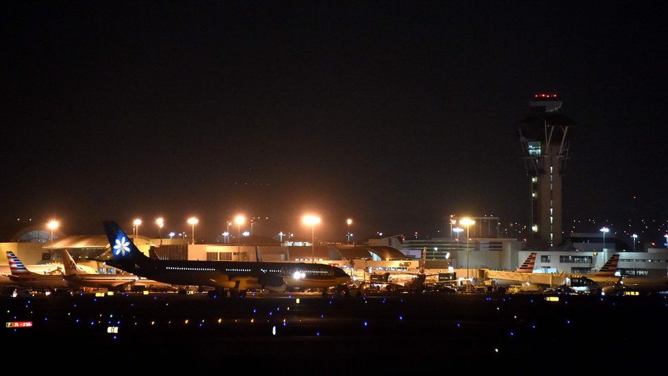 Planes are grounded on the tarmac at Los Angeles International Airport (LAX) late on 28 August 2016