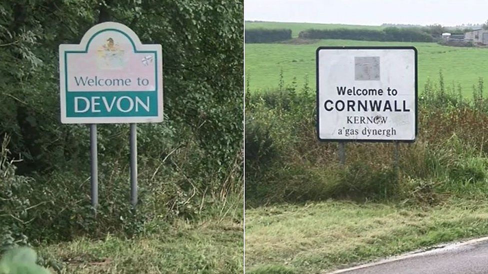 A sign from each county