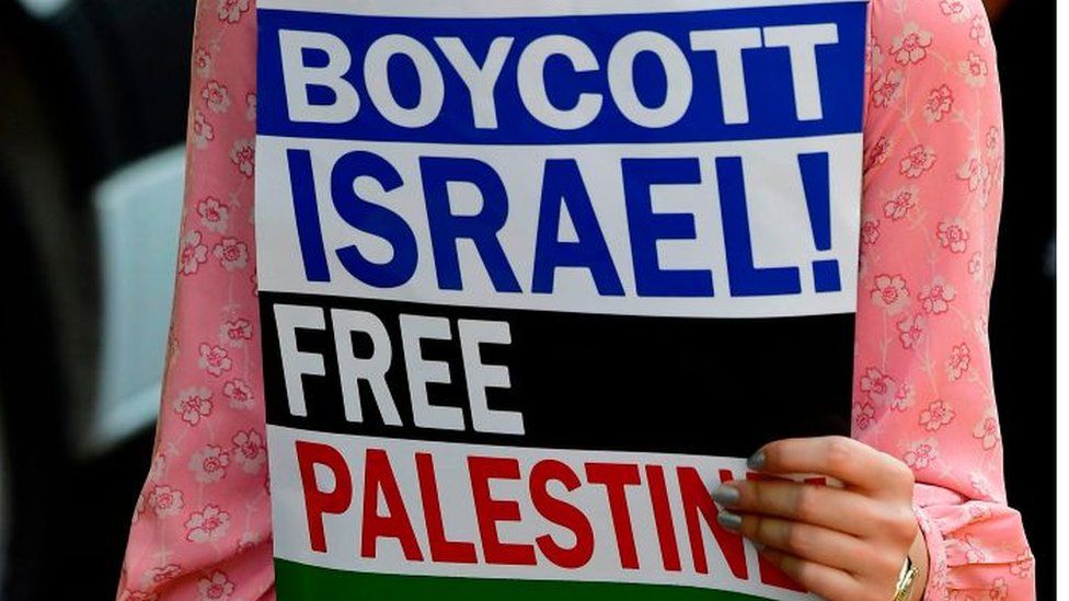 Sign reading Boycott Israel, Free Palestine
