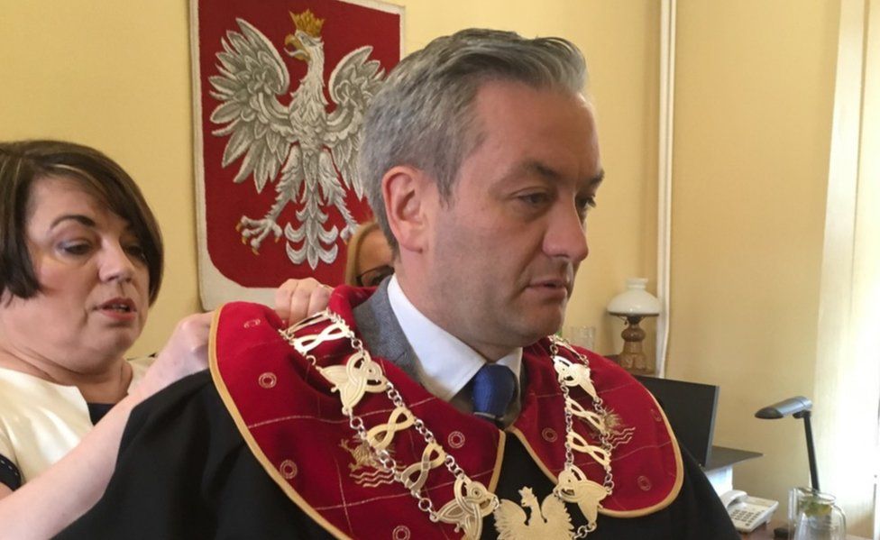 Robert Biedron in his mayor's garb in Slupsk