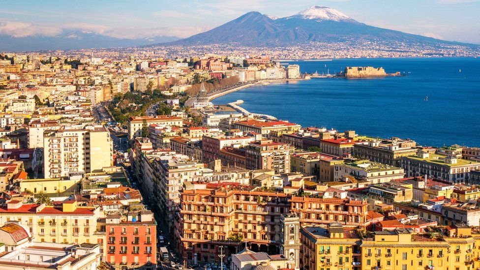 Aerial shot of Naples with Vesuvius in the background