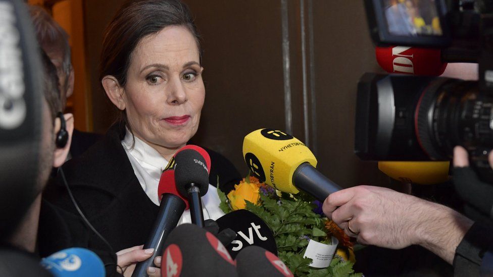 Swedish Academy's Permanent Secretary Sara Danius talks to journalists as she leaves a meeting of the Swedish Academy in Stockholm