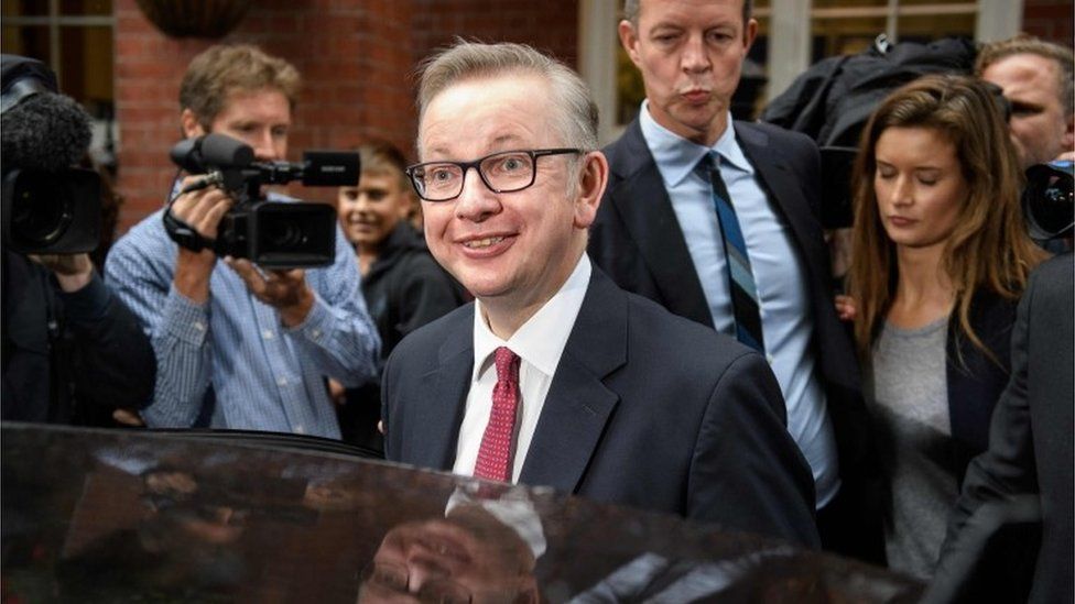 Michael Gove leaves a hotel in London