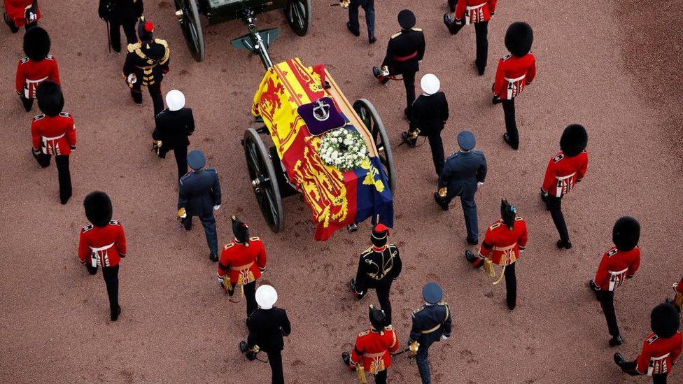 The gun carriage bearing the coffin of the late Queen Elizabeth II