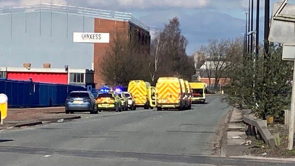 Emergency service vehicles on Tenax Road