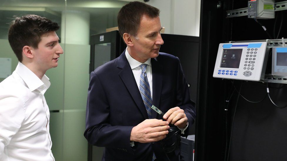 Jeremy Hunt creates a "cyber attack" during a visit at the University of Glasgow.