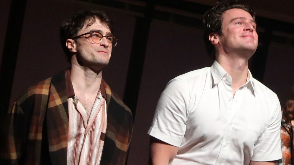 Daniel Radcliffe and Jonathan Groff during the opening night curtain call for Stephen Sondheim's "Merrily We Roll Along" on Broadway at The Hudson Theater on October 8, 2023 in New York City