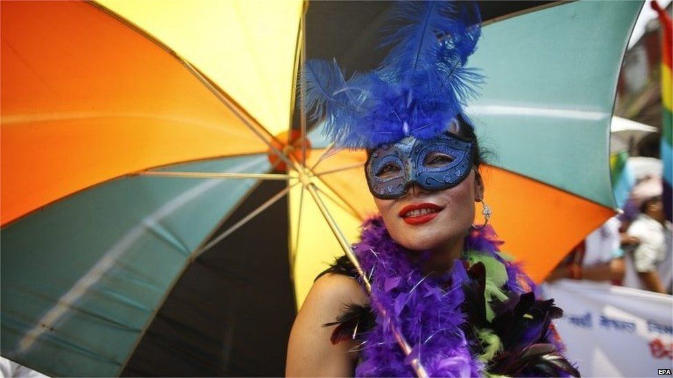 A member of the LGBT community takes part during the pride parade in Kathmandu, 30 August 2015.