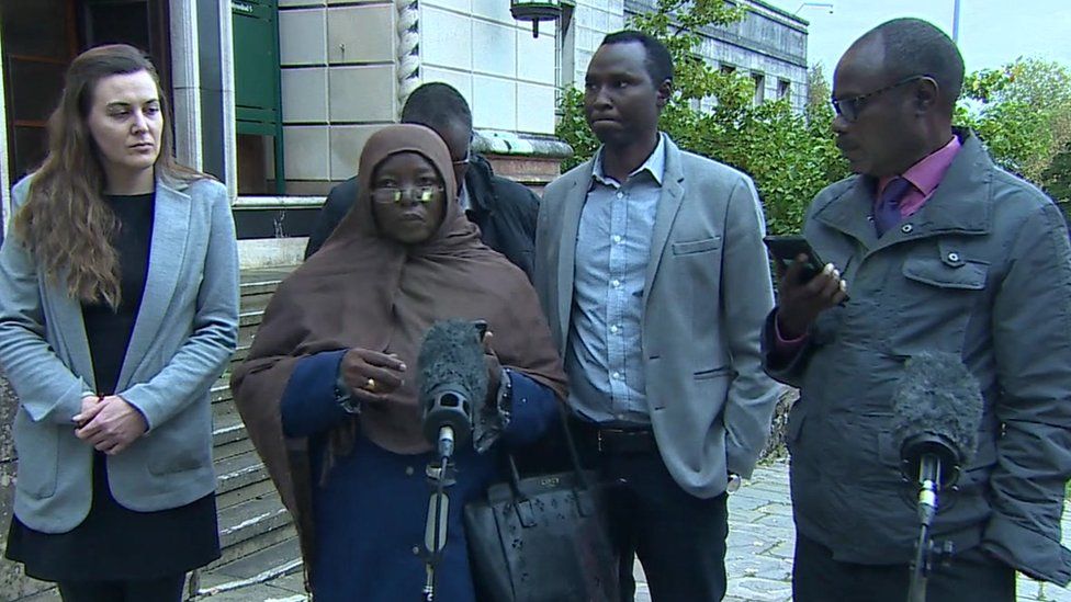 Mustafa Dawood's family outside the inquest court