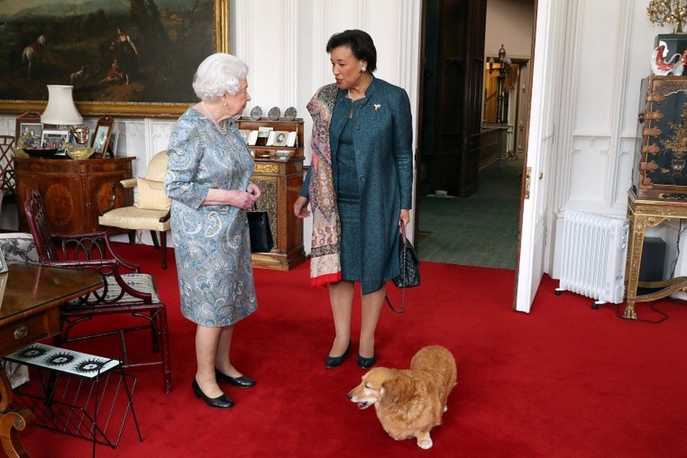 Baroness Scotland in discussion with the Queen