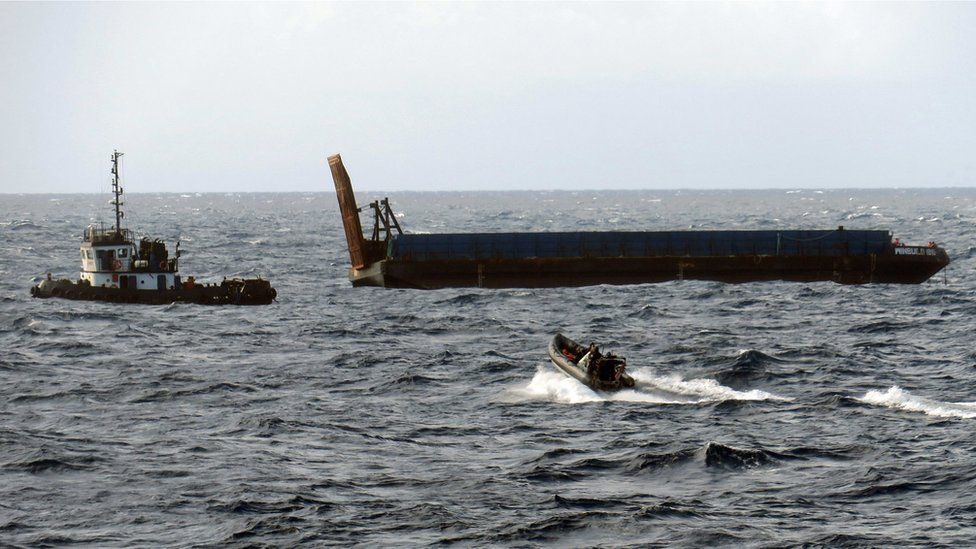 Sinking ocean tug boat