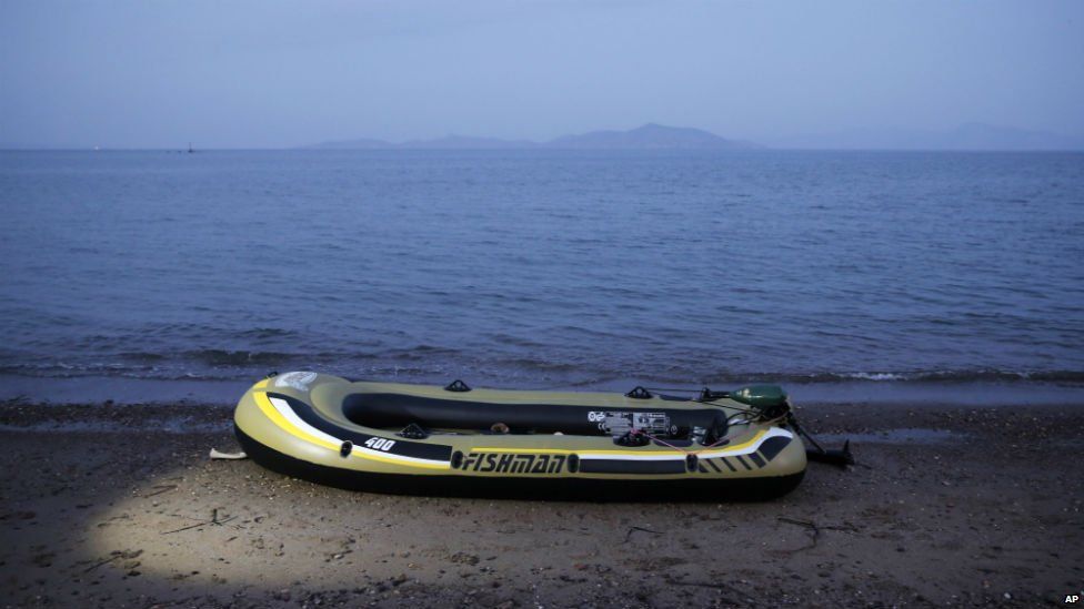 An abandoned rubber dinghy on a beach near the coastal town of Bodrum, Turkey - 16 August 2015