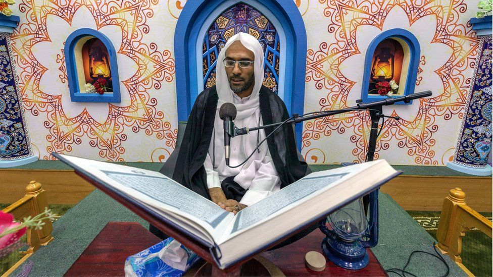 File image of a Saudi cleric reading from the Koran in a mosque