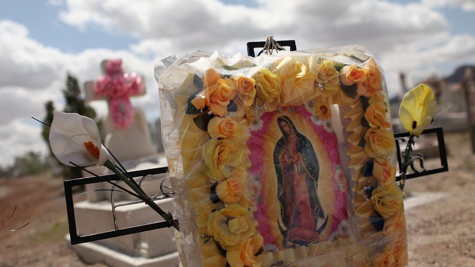 Graves are seen in a cemetery in a poor Juarez neighbourhood where many of the deceased are victims of violent crime on 24 March, 2010 in Juarez