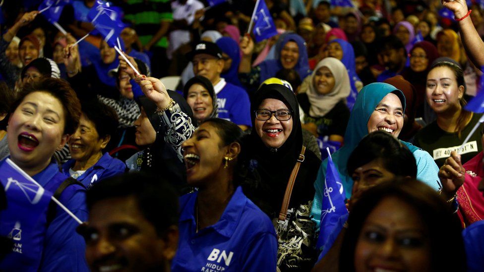 Supporters react to a speech by Malaysia's Prime Minister Najib Razak