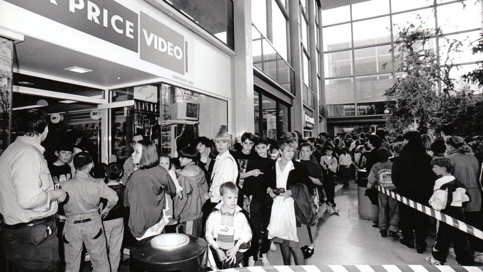 Queues outside a video store