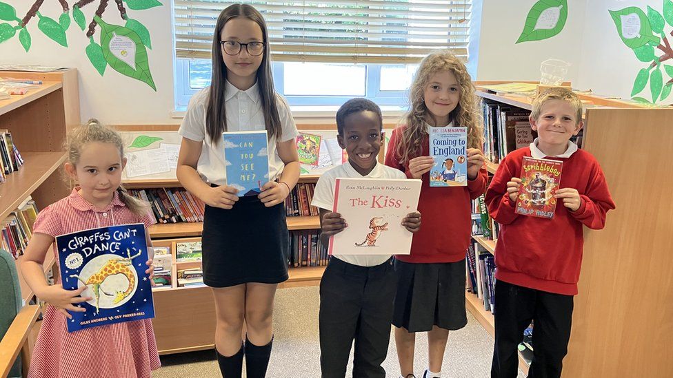 Children with their books