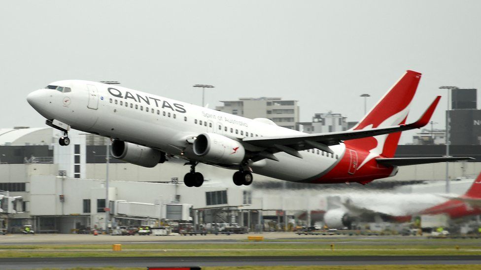 A Qantas plane takes off from the Sydney International airport on May 6, 2021