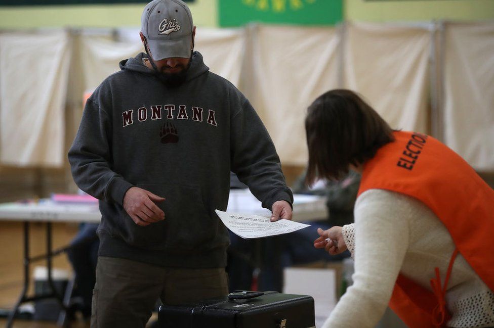 A Montanan votes at the Hellgate Elementary School in the city of Missoula on Thursday