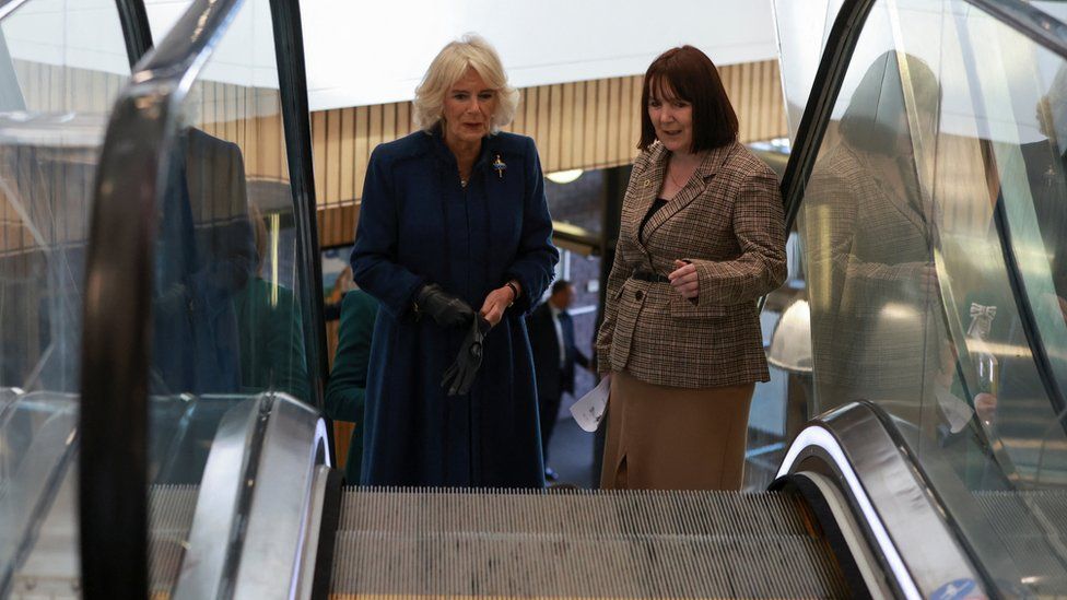 Camilla on an escalator at Southwater library, Telford
