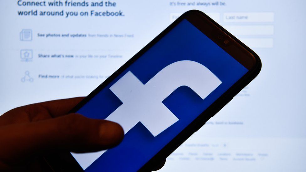 In this photo illustration a Facebook logo seen displayed on a smartphone.