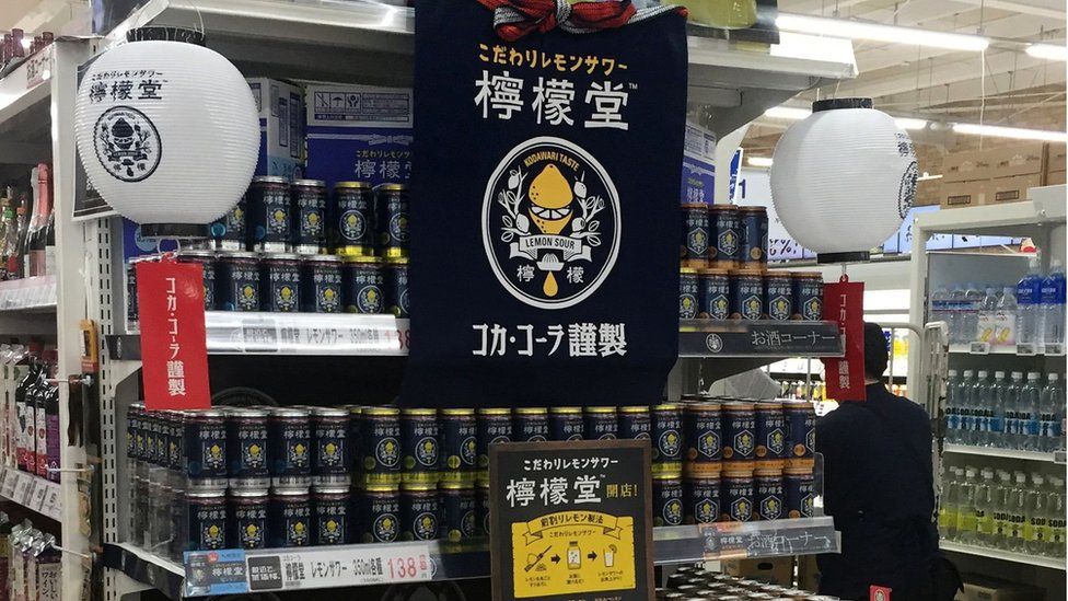 The new cans on a supermarket shelf