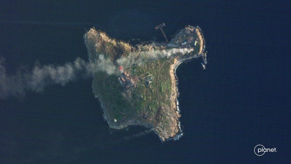 Satellite view shows smoke rising over Snake Island, Ukraine amid Russia"s attack on the country, May 8, 2022