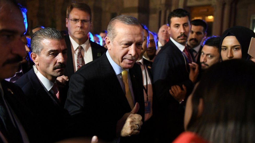 Turkish President Tayyip Erdogan gives a thumbs up to supporters outside of The Peninsula hotel on the sidelines of the United Nations General Assembly in Manhattan, New York, U.S. September 20, 2017.