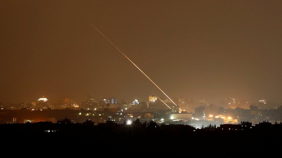 Rockets are launched from the northern Gaza Strip towards Israel, as seen from Sderot, Israel