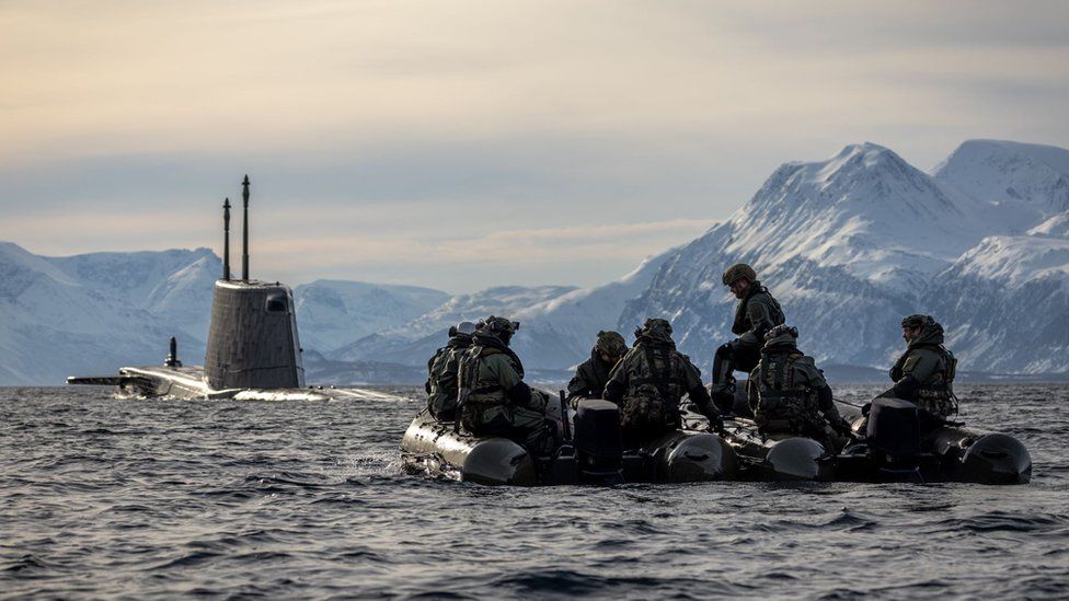 Royal Navy personnel in dinghy taking part in Operation Cold Response