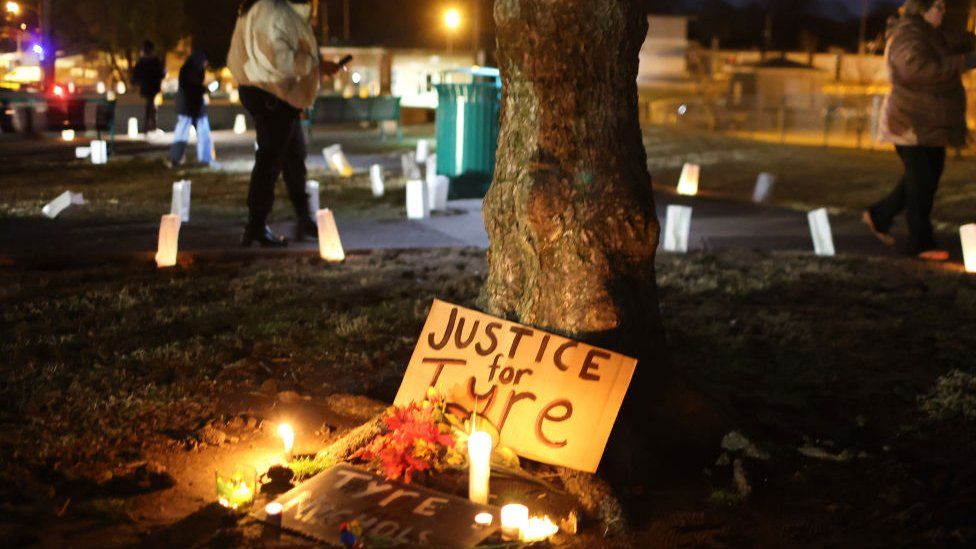 People attend a candlelight vigil in memory of Tyre Nichols at the Tobey Skate Park on 26 January in Memphis, Tennessee