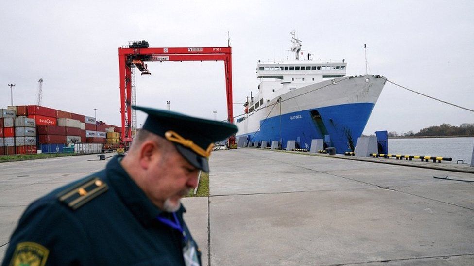 A Russian customs officer works at a commercial port in the Baltic Sea town of Baltiysk in the Kaliningrad region, Russia, in October 2021