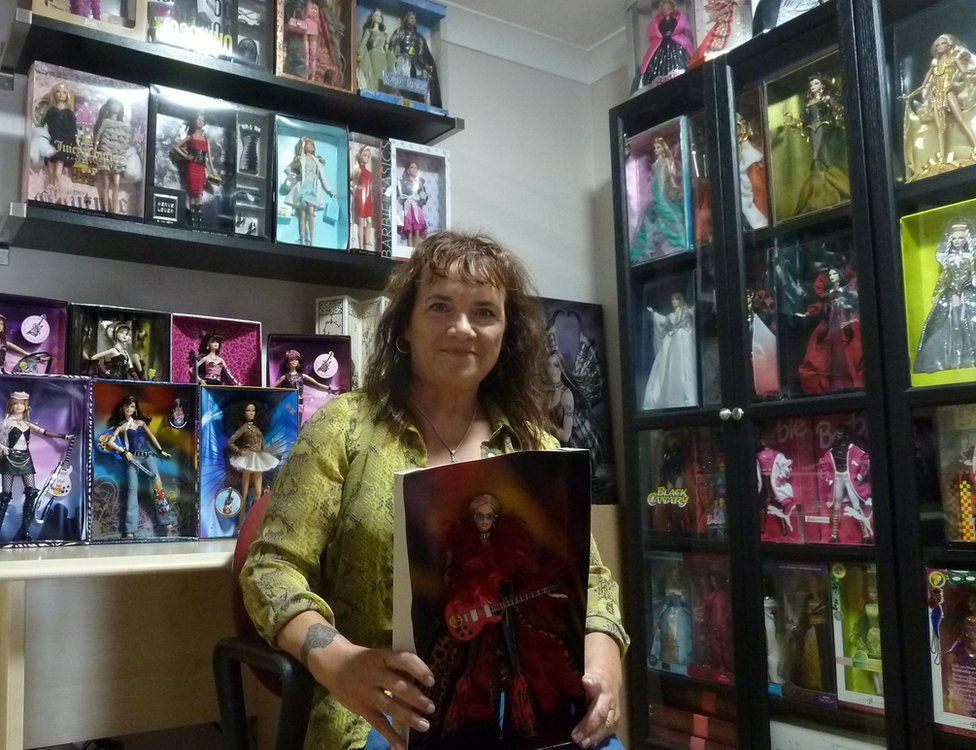 Linda Richardson with some of her Barbie collection
