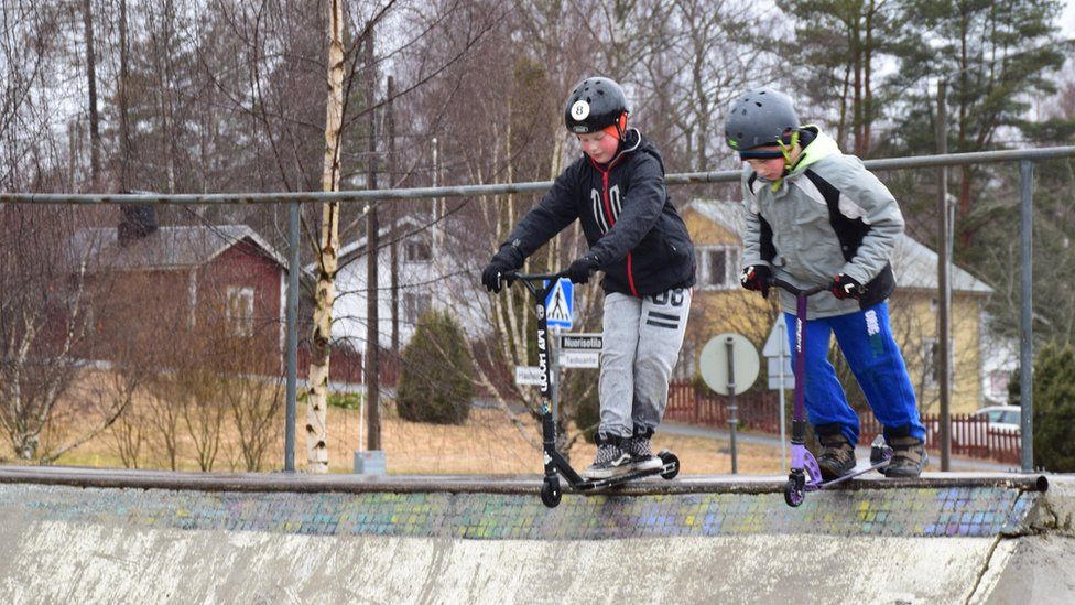 Kids on their scooters at Hauho Comprehensive School, Finland