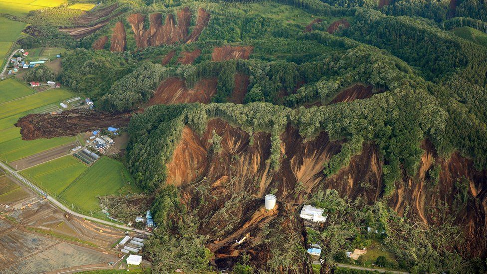 Big landslides engulfing houses and roads