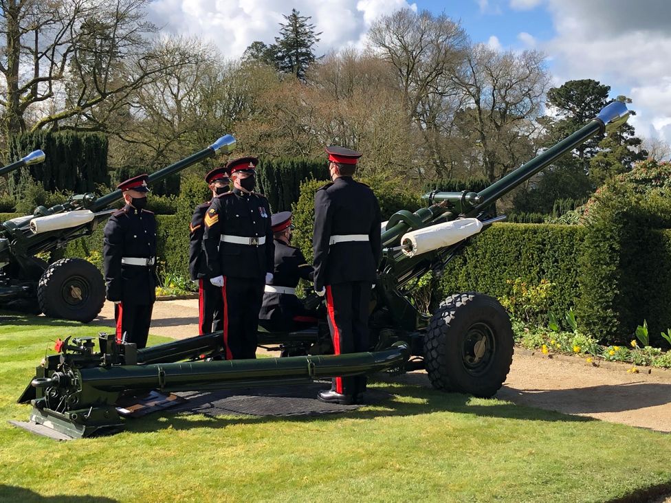 Military personnel wore black face coverings for the gun salute at Hillsborough Castle in County Down.