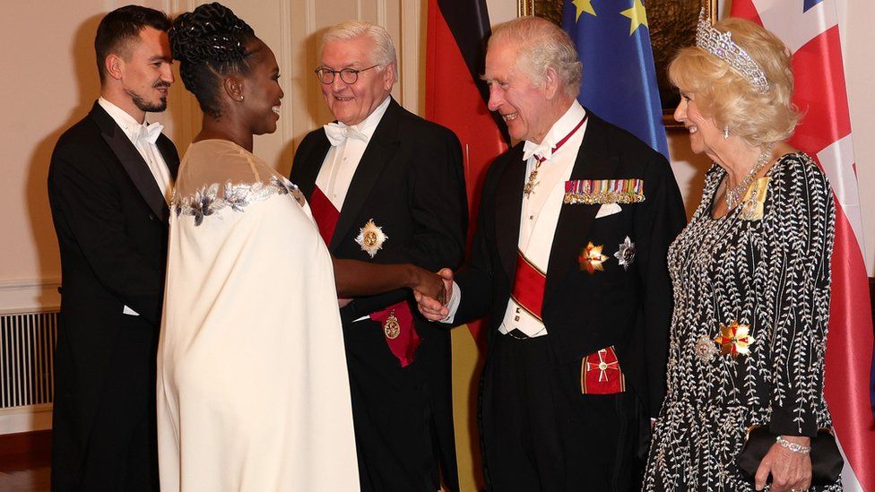 German President Frank-Walter Steinmeier, Britain's King Charles III, Camilla, Queen Consort greet Evgenij Voznyuk and Motsi Mabuse