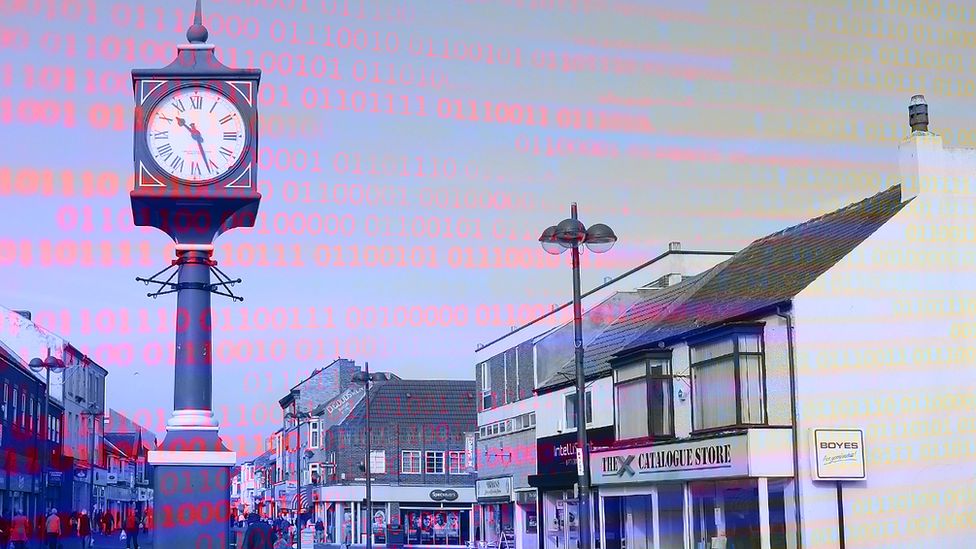 A graphic showing digital code overlaid on a photograph of Redcar town centre