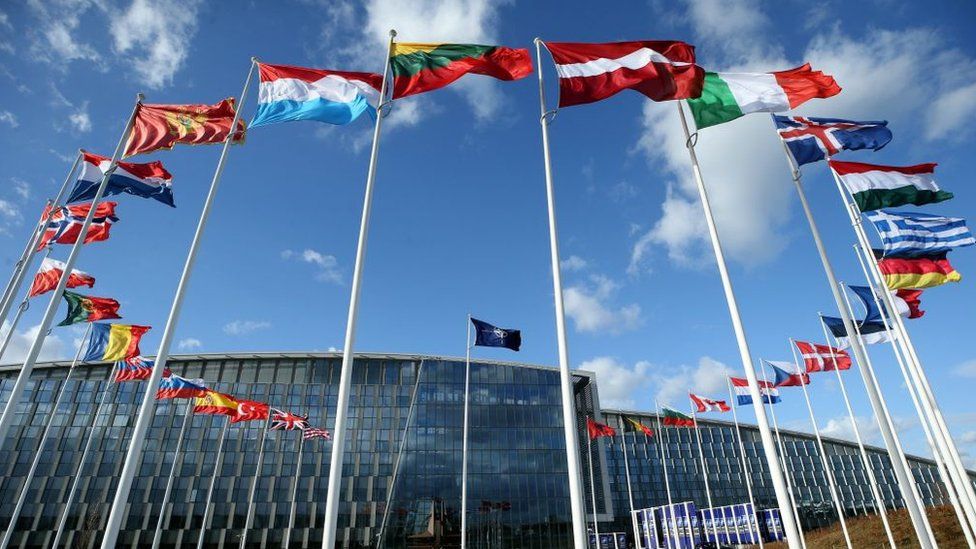 Flags of members of North Atlantic Treaty Organization (NATO) outside of the NATO Headquarters in Brussels, Belgium on 14 March 2019