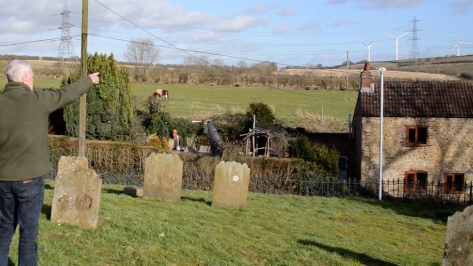 View of Sancton Hill Wind Farm from the village church yard