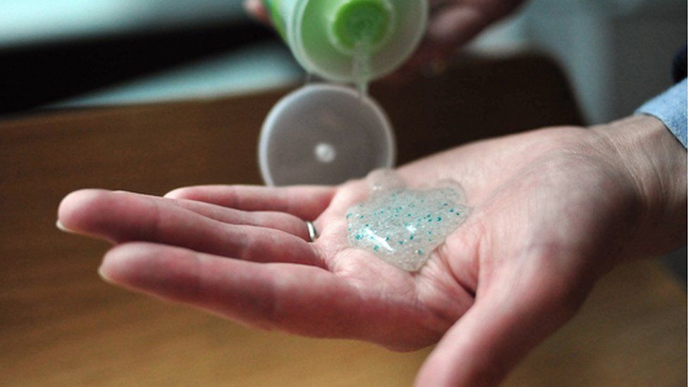 woman's hand with microbead gel