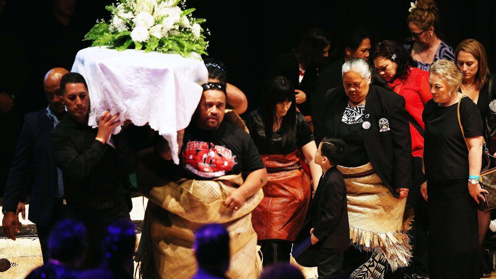 Jonah Lomu's family follow his casket at the service