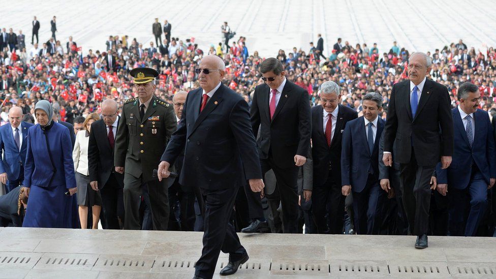 Parliamentary speaker Ismail Kahraman walks up the stairs of Ataturk's Mausoleum in Anitkabir, 23 April